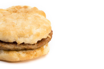 Sausage Biscuit Breakfast Sandwich on a White Background
