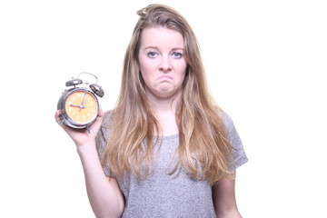 Caucasian woman with an alarm clock