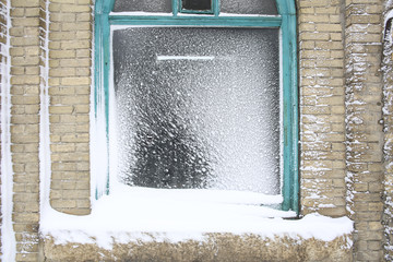 windown covered by snow
