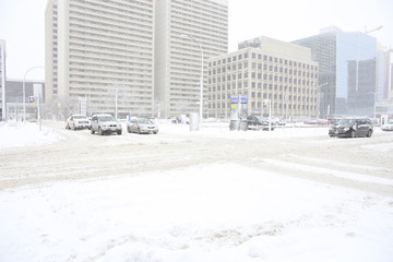 car traffic in a snow corner street
