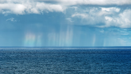 rain curtains with light rainbow colors maui hawaii