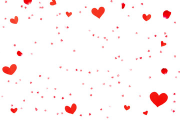 Red heart shapes and rose petals on white paper background