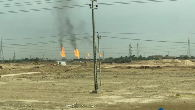 Driving By The Rumaila Oil Fields Near Basra, Iraq