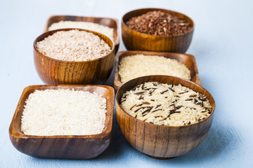Six bowls with different varieties of rice