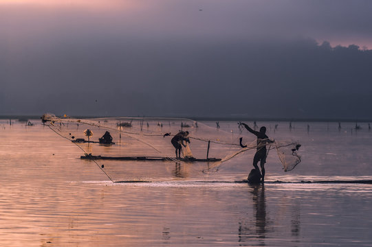 Fishing activity in JOMBOR lake in golden hours early morning.