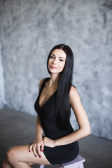 Fototapeta premium Beautiful woman in black dress.