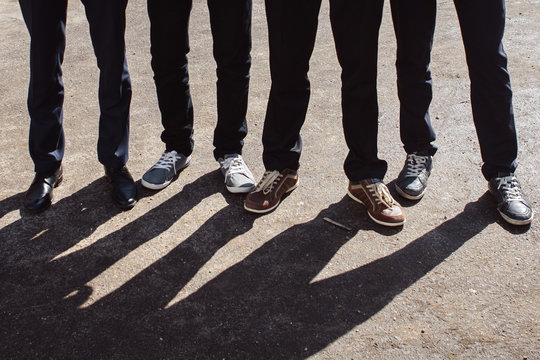 Legs of people with shadow