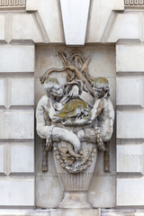 Neoclassical building Somerset House in the district Covent Garden, relief on facade, Mermen, London, United Kingdom