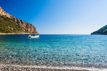 Fototapeta premium Motor boat anchored in bay