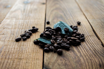 coffe beans and green leaf