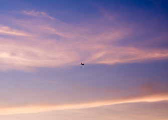 Fluffy clouds in the blue sky with morning light from the sunrise