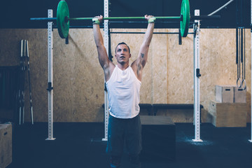 Man doing thruster exercise