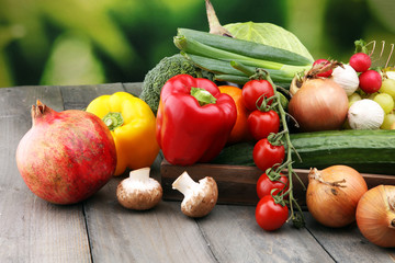 Composition with variety of raw organic vegetables and fruits. Balanced diet