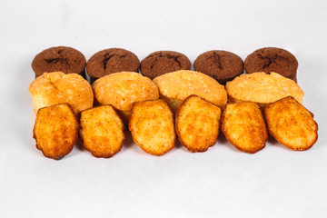 Traditional French biscuits and cookies on white background
