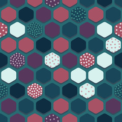 Vector seamless pattern with multicolored hexagons.