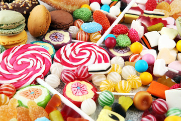 Fototapeta na wymiar candies with jelly and sugar. colorful array of different childs sweets and treats