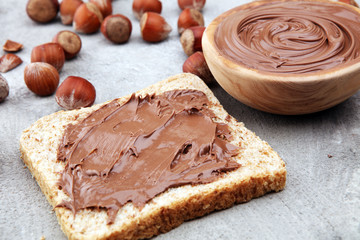 Homemade hazelnut spread in wooden bowl. Hazelnut Nougat cream