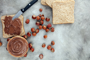 Homemade hazelnut spread in wooden bowl. Hazelnut Nougat cream