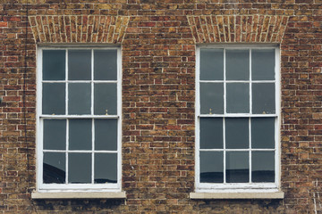Two Sash Windows in Brick Wall, Split Toning Shallow Depth of Field Architecture Details - 195119382