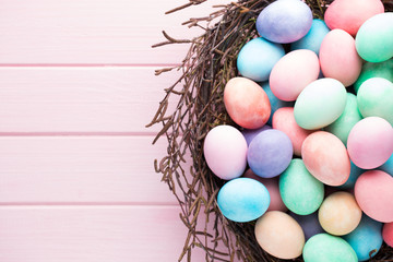 Easter colored eggs on the vintage background.