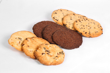 Three kinds of different cookies on white background