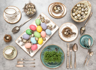 Fototapeta na wymiar Easter decoration colorful eggs Holidays table setting