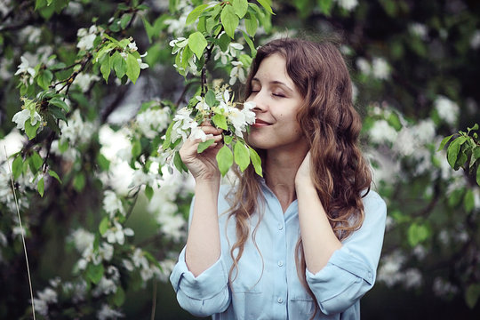 woman spring apple flowers