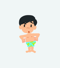Asian boy in a swimsuit with an expression of unpleasant surprise.