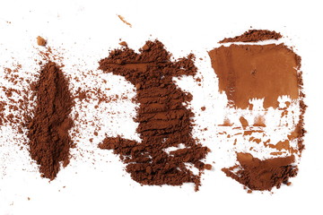 Cocoa powder pile isolated on white background, top view