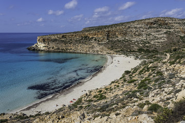 Obraz premium The Rabbit beach in Lampedusa, Pelagie islands is a wild beach, protected by WWF , for being home of the extinct loggerhead turtles, who lay theirs eggs in the area, 