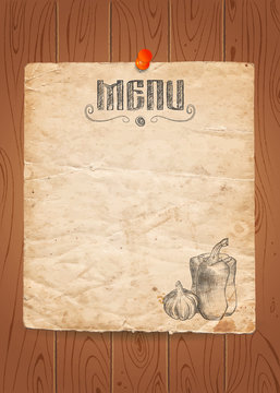 Menu of restaurant with vegetables on old paper and wooden background