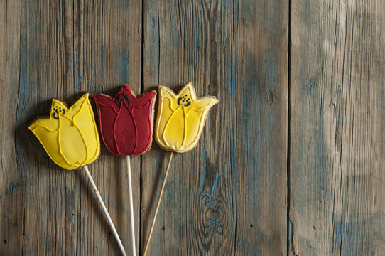 Cookies in shape of flowers tulips. Top view, place for text,copy space
