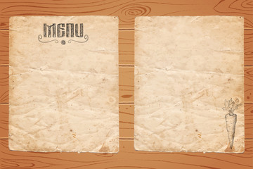 Menu of restaurant with carrot on old paper and wooden background