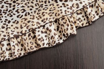 Background in a brown tone with a leopard texture