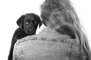 Caucasian woman with a puppy