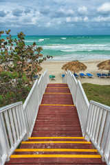 Fototapeta premium Sea view, beautiful beach with blue sky, sand sun daylight, holiday summer concept.