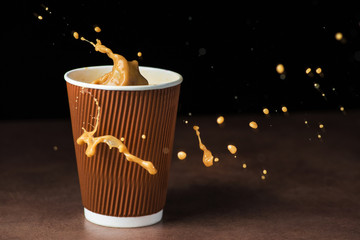 Splash of coffee in cup