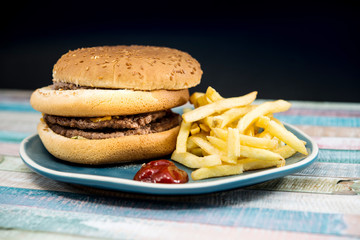 Cheese burger - American cheese burger with Golden French fries