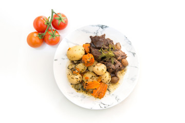 Beef meat stewed with potatoes-Traditional French cuisine Beef Bourguignon potatoes carrots in persillade