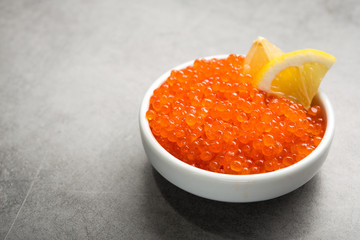 Red caviar witl slice lemon