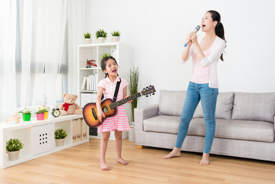 Mom and daughter hold their concert.