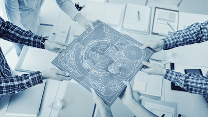 Business people assembling a puzzle