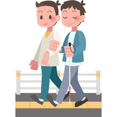 視覚障害者と介助する男性