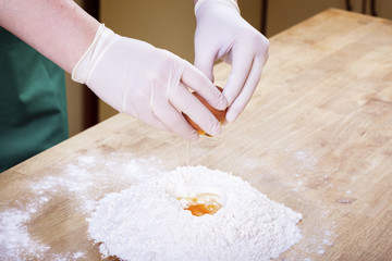 Making dough by female hands