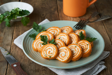 Egg roll with tomato paste, cheese and fresh greens 