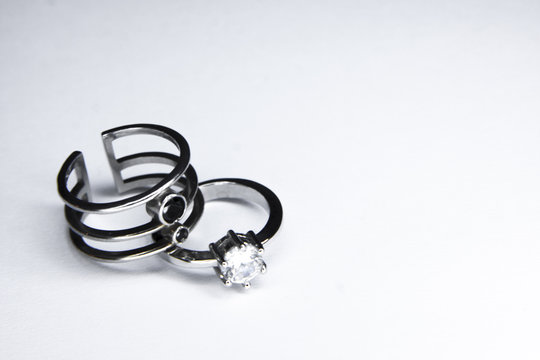 Focused old designed silver rings on a white background