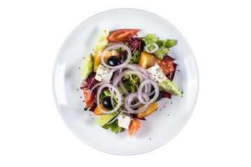 Salad in taller isolated on white background. Top view.