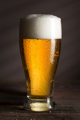 Condensated glass of light beer
