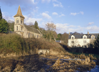 England, Cotswolds, Gloucestershire, the church stands over the disused weed filled Thames & Severn Canal at Chalford