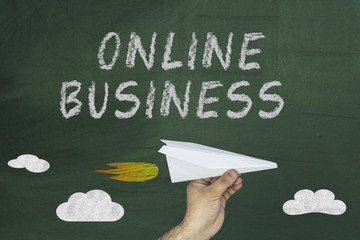 Online business words on blackboard